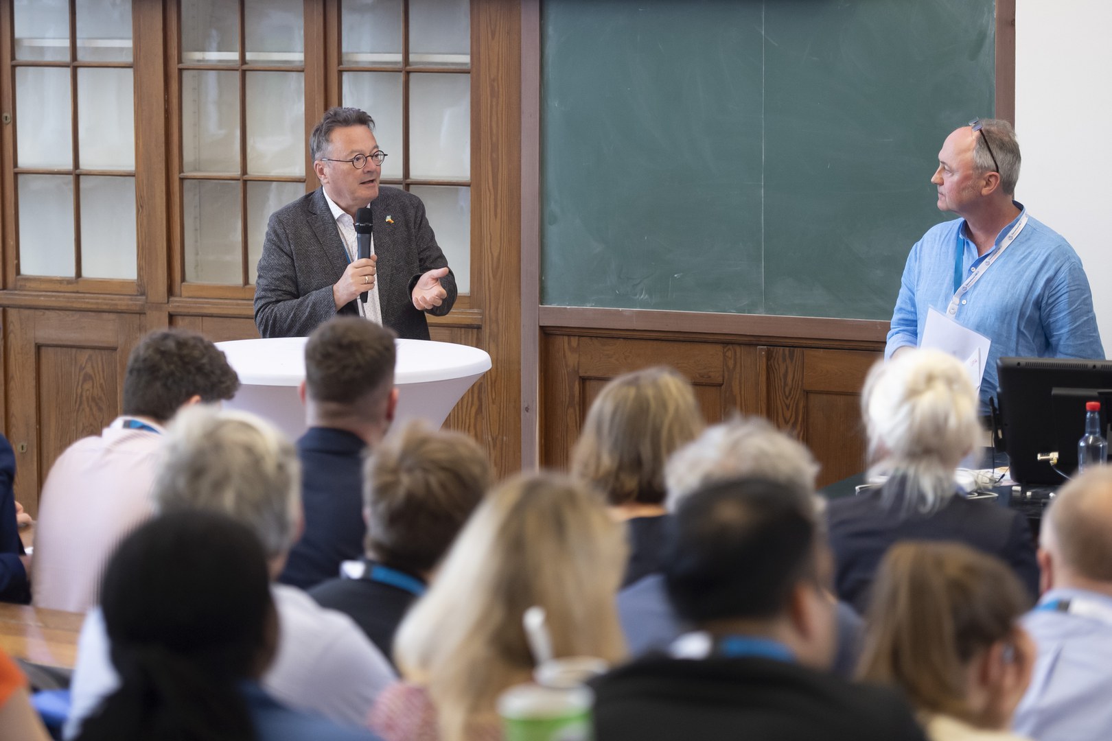Prof. Dr. Klaus Greve from GIUB and Prof. Dr. Jörg Szarzynski from EHS, two of the founders of the Joint Master’s, closed the event by holding a round table discussion with current Joint Master’s students and alumni